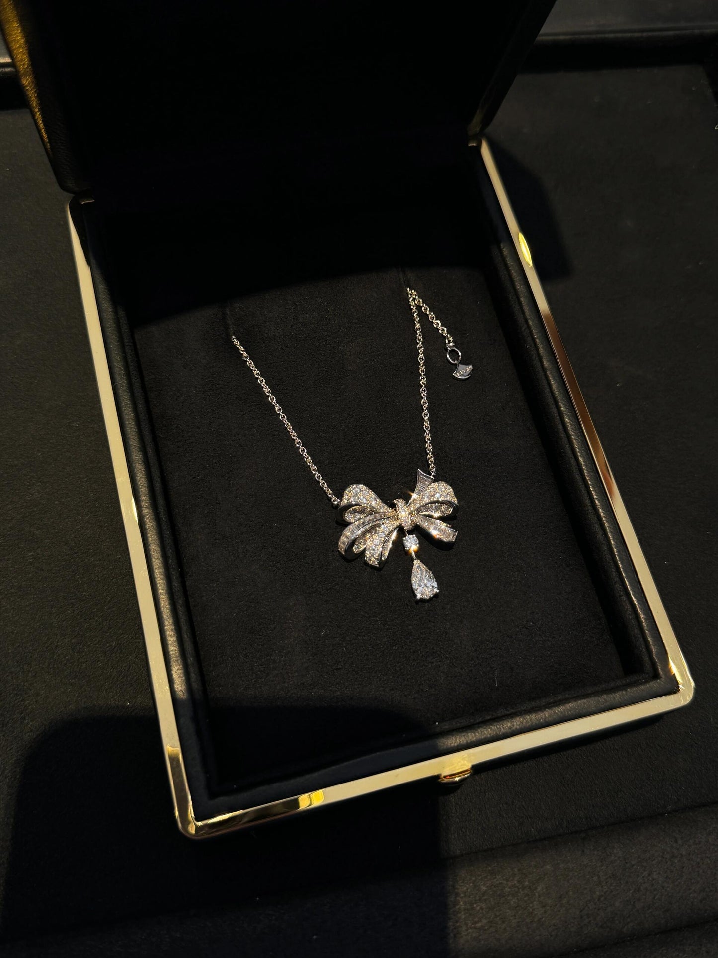 Elegant Bowknot Diamond Necklace with Teardrop Pendant